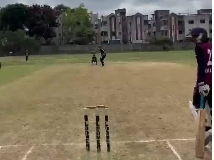 Bowler delivering the ball during a match