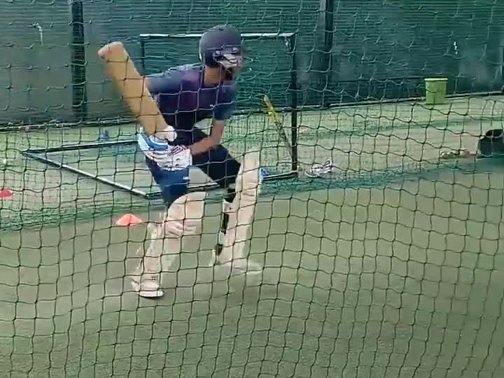 Batter practicing in the nets during morning session